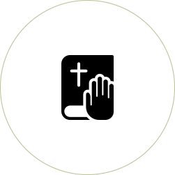 A black and white icon of a bible with a cross on it.